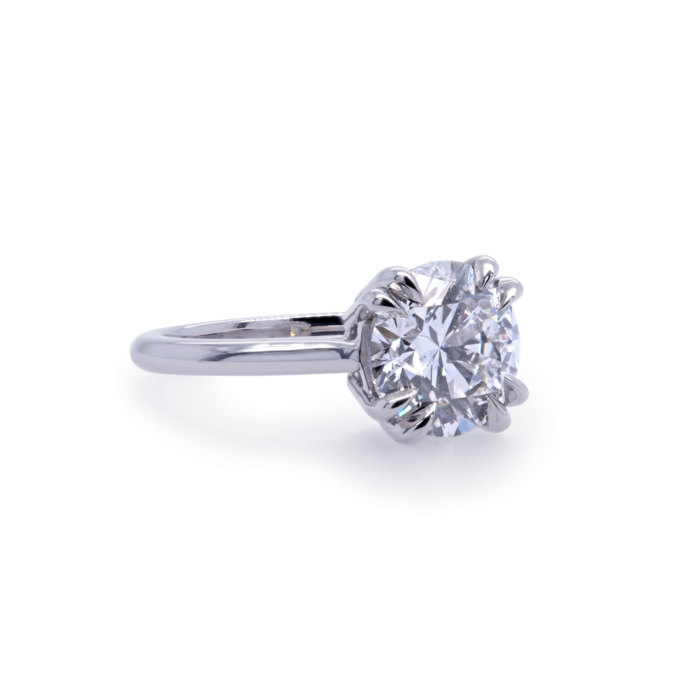 Side angle of EOS 3ct lab-grown diamond engagement ring in platinum, solitaire style by Janine Jewels.