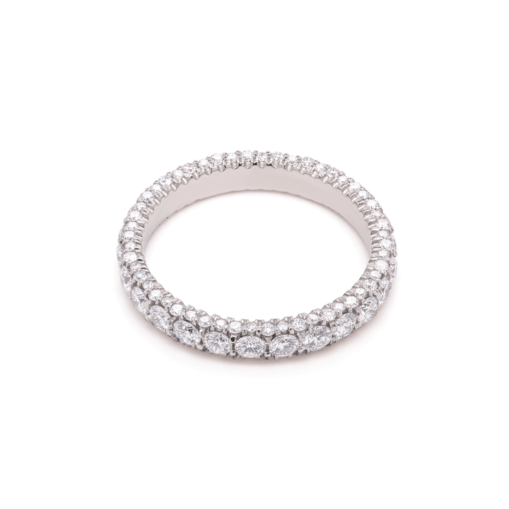Unisex eternity band in platinum, shimmering with lab-grown diamonds. Shown on white background.