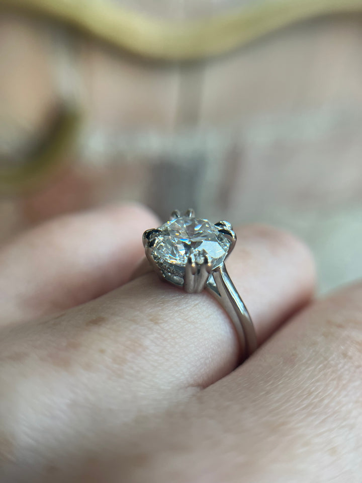 EOS engagement ring in platinum with 3ct lab-grown diamond, worn in natural light, handcrafted by Janine Jewels Toronto.