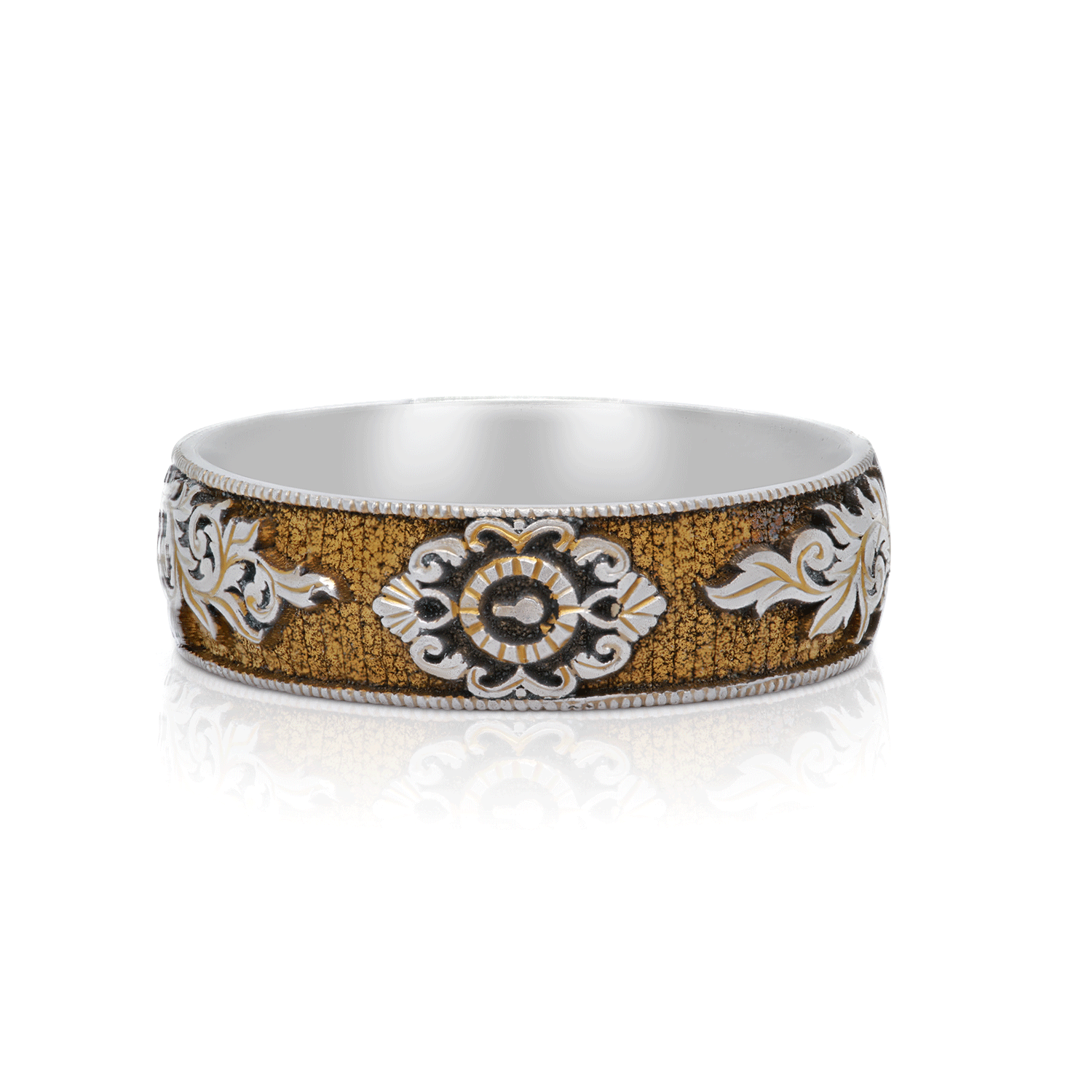 The band appears to be made of metal, possibly silver or a similar tone, and features a design that incorporates a muted gold or yellow tone in a geometric or stylized pattern. 