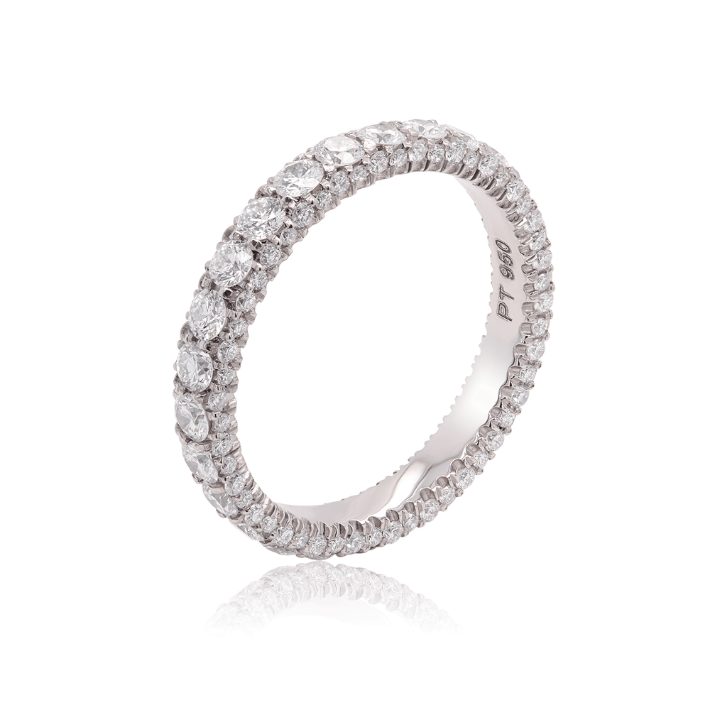Three-sided platinum band adorned with lab-grown diamonds. 3 quarter view on white background.