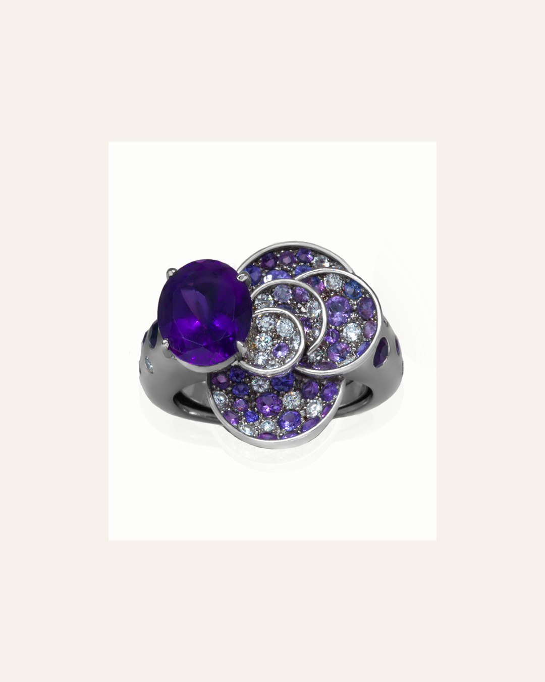 18K white gold ring with amethyst center stone and sapphire and diamond melees. February Birthstone jewellery