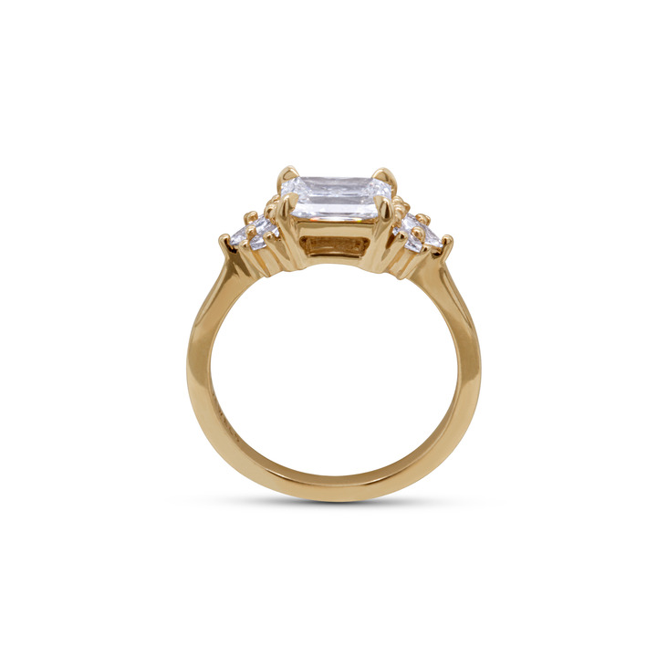 Radiant cut lab-grown diamond engagement ring in yellow gold with six accent diamonds, front-facing view