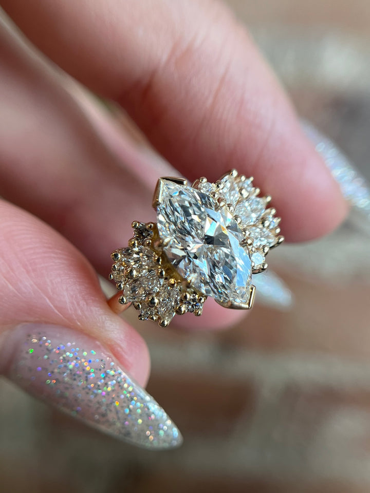 Clara 2ct marquise lab-grown diamond ring in recycled yellow gold, worn in natural light, fine jewellery by Janine Jewels.