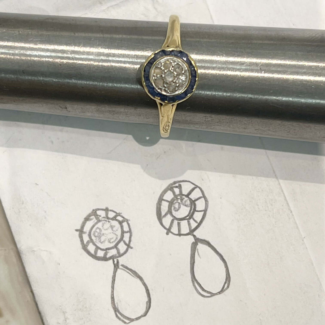 Vintage lady's ring with channel set sapphires and pave set diamonds in yellow gold. Ring is being repaired and transformed into earrings